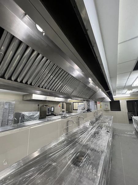 stainless steel kitchen equipment, including gas and hood system installation
